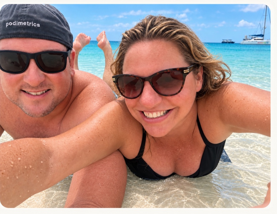 Brian and Teryn smiling together at the beach